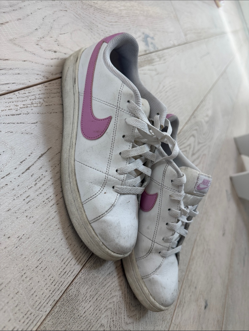 Nike White Sneakers with Pink Swoosh